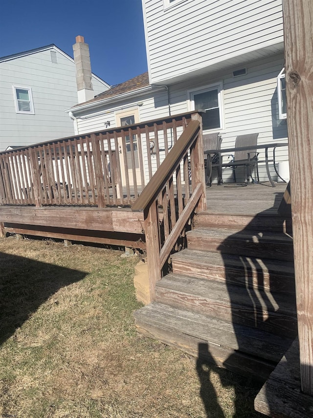 deck featuring a yard