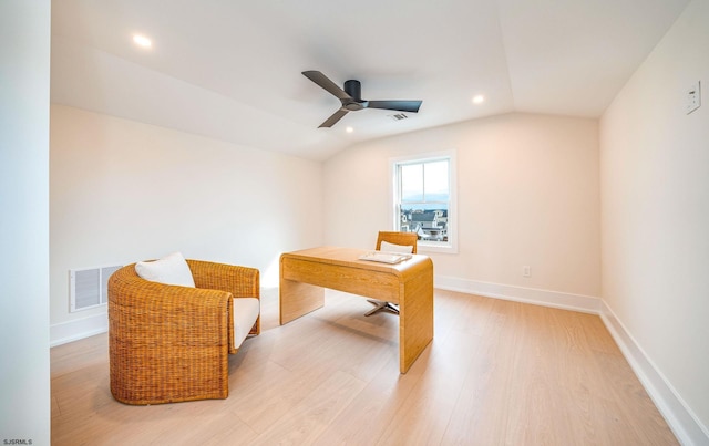 office featuring ceiling fan, lofted ceiling, and light hardwood / wood-style flooring