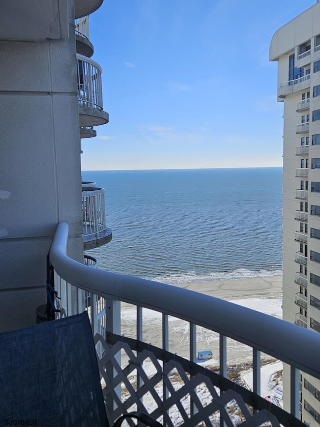 property view of water featuring a beach view