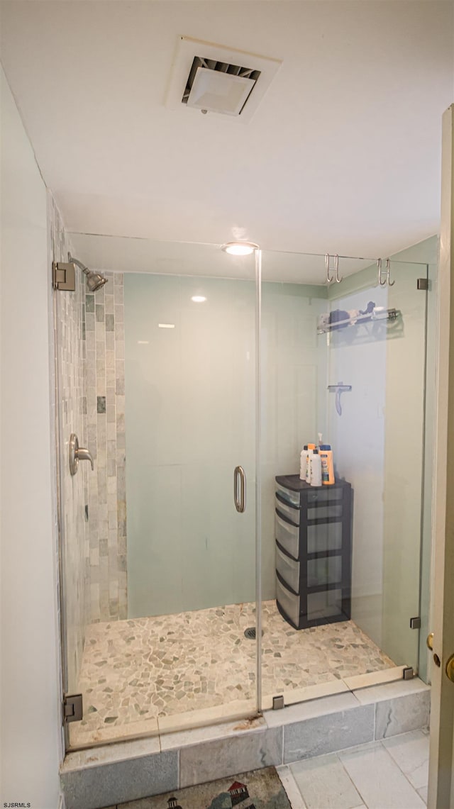 bathroom featuring walk in shower