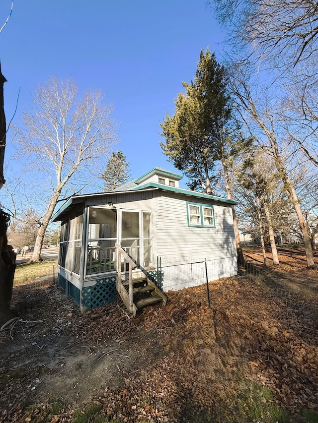 exterior space with a sunroom