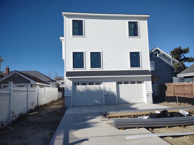 view of front of home featuring a garage