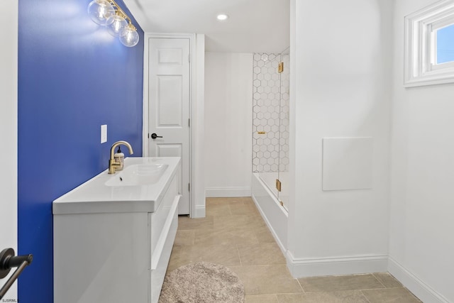 bathroom featuring tile patterned floors, vanity, and shower / bathing tub combination