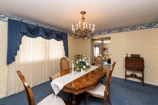 carpeted dining area with an inviting chandelier