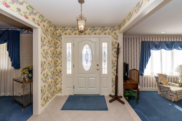 entryway with tile patterned floors