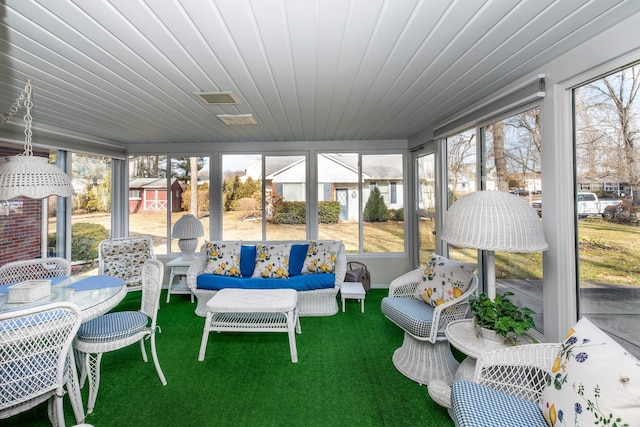 sunroom / solarium with wooden ceiling