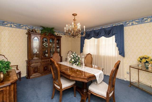 dining room featuring carpet flooring and an inviting chandelier