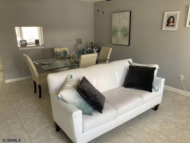 living room featuring light tile patterned floors