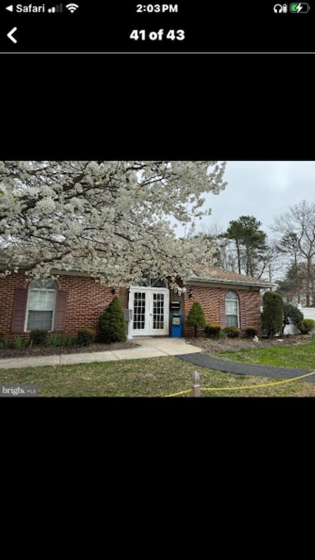 view of front of property with french doors