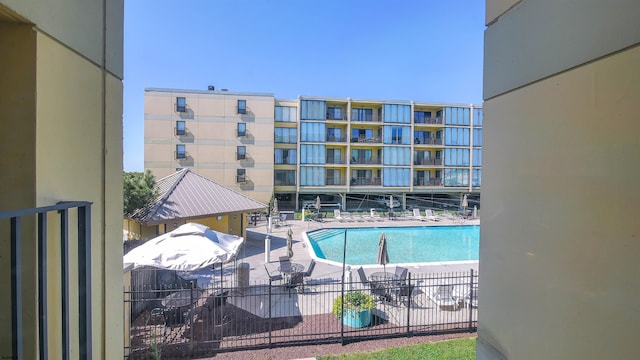 view of swimming pool with a patio area