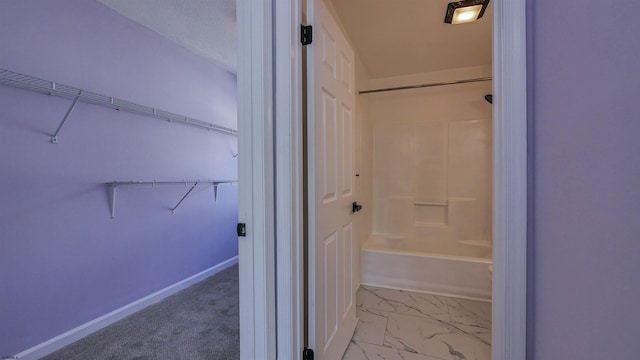 bathroom featuring  shower combination