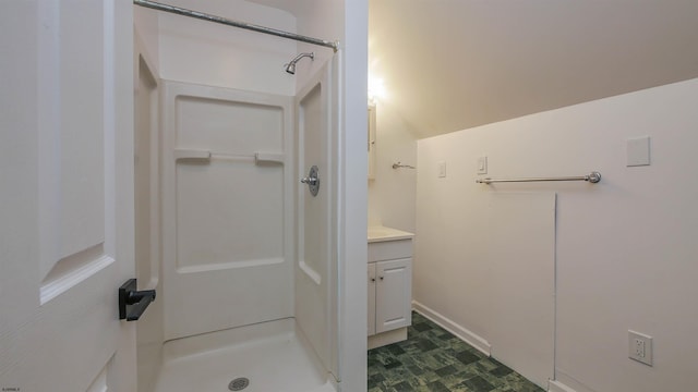 bathroom with vanity and walk in shower