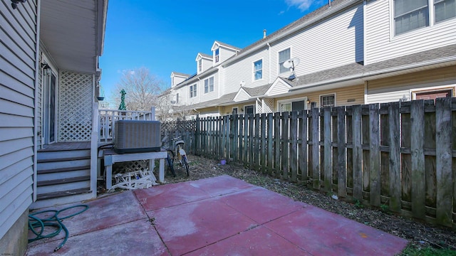 view of patio / terrace with central AC unit