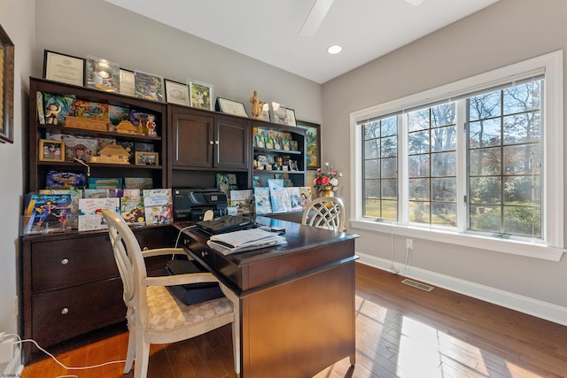 office area with wood-type flooring and ceiling fan