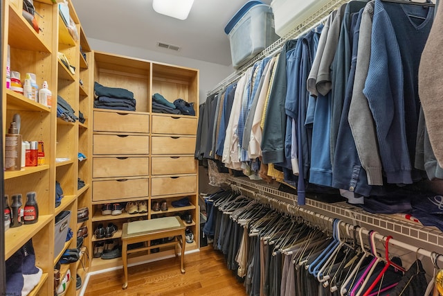 walk in closet featuring light hardwood / wood-style floors