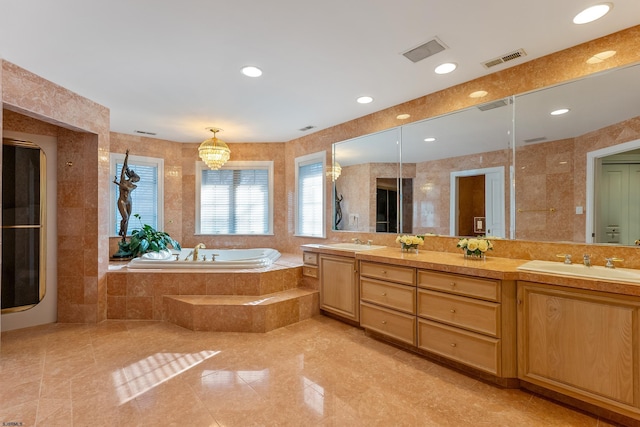 bathroom featuring vanity, tile walls, and plus walk in shower