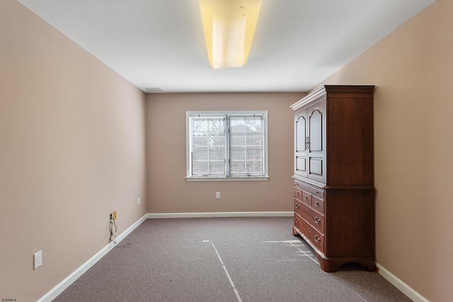 unfurnished bedroom featuring carpet