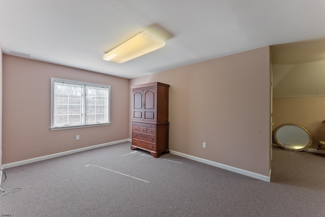 unfurnished bedroom featuring carpet floors