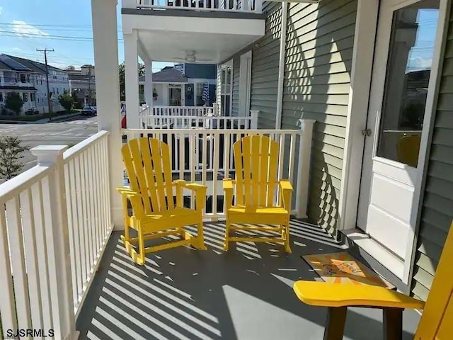 balcony featuring a porch