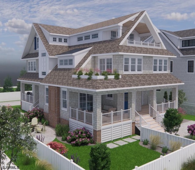 view of front of home with a front lawn and covered porch