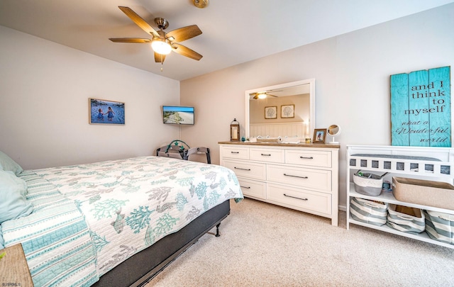 bedroom with light colored carpet and ceiling fan