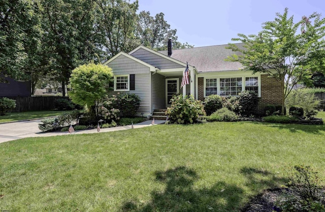 view of front of home with a front yard