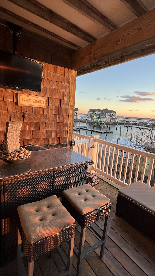 deck at dusk with a water view