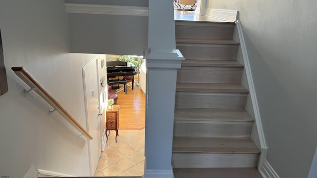 stairs with tile patterned floors