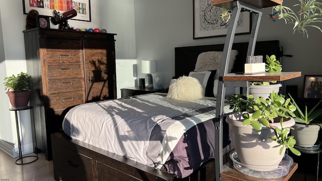 bedroom with wood-type flooring