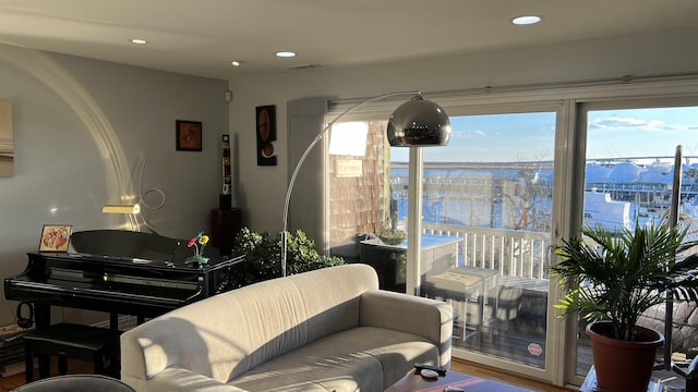 living room featuring a water view