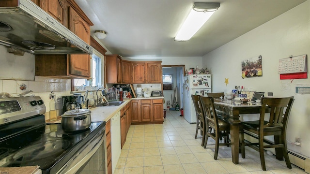 kitchen featuring sink, white appliances, backsplash, light tile patterned flooring, and exhaust hood