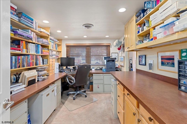 office space with light colored carpet