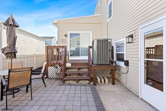 view of patio with central AC unit