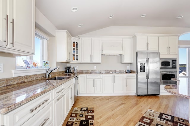 kitchen featuring white cabinetry, appliances with stainless steel finishes, and light stone countertops