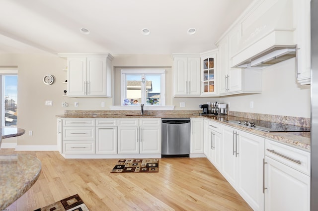 kitchen featuring sink, white cabinetry, black electric cooktop, dishwasher, and custom range hood