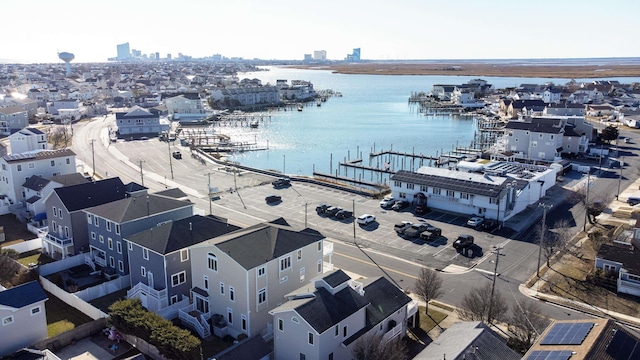 drone / aerial view with a water view