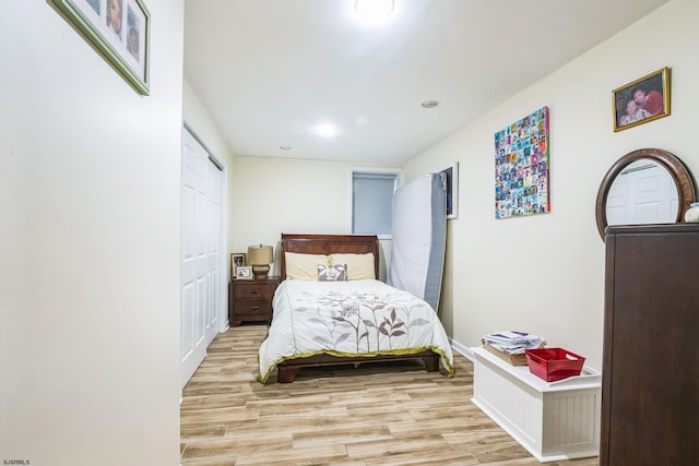 bedroom with light hardwood / wood-style flooring