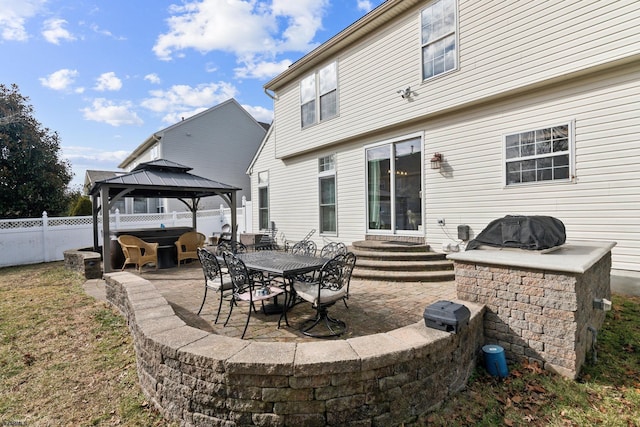 view of patio / terrace featuring a gazebo and grilling area