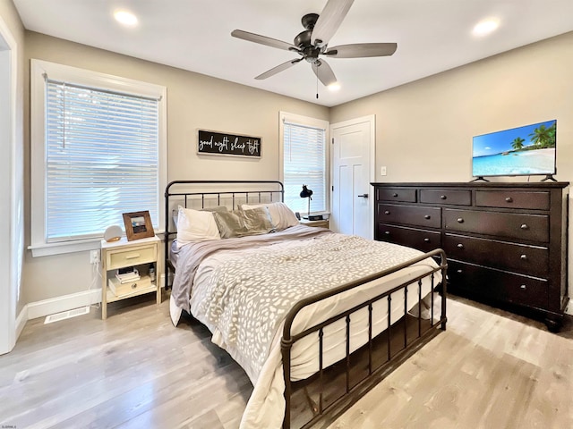 bedroom featuring ceiling fan and light wood-type flooring