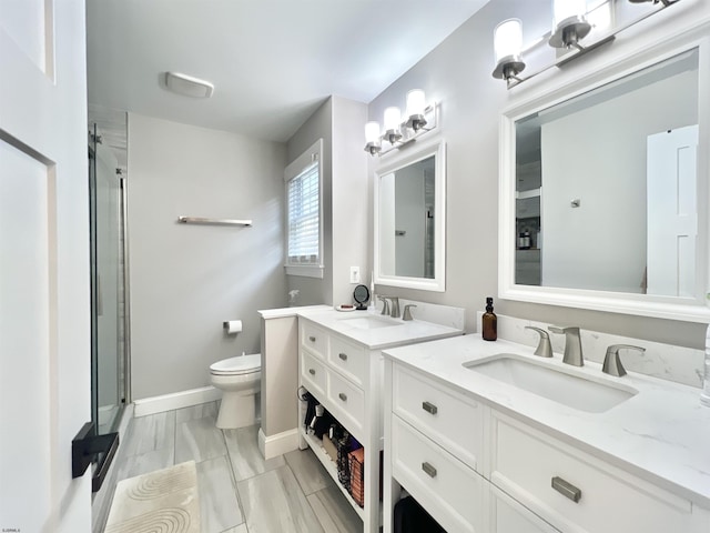 bathroom with toilet, vanity, and walk in shower