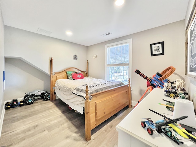 bedroom featuring light hardwood / wood-style floors