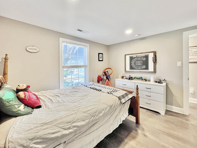 bedroom featuring light hardwood / wood-style flooring