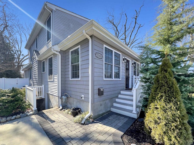 view of side of home featuring a patio area