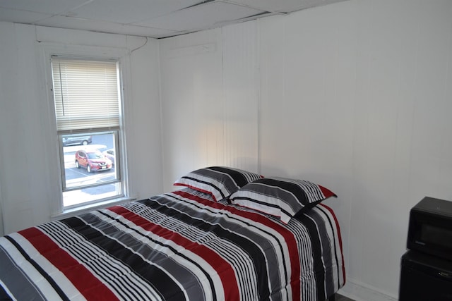 bedroom with a drop ceiling