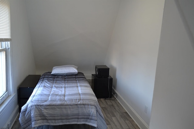 bedroom featuring hardwood / wood-style flooring