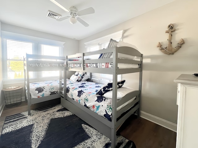 bedroom with ceiling fan and hardwood / wood-style floors