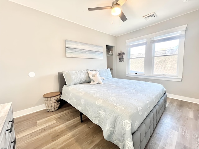 bedroom featuring ceiling fan and light wood-type flooring