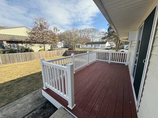 wooden terrace with a yard