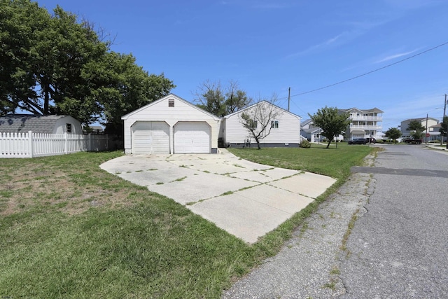 garage with a lawn