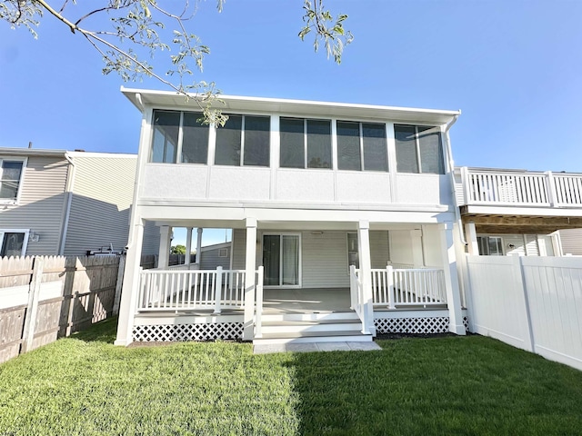 706B Lagoon Blvd Unit B, Brigantine, NJ 08203 - rear view of property featuring a porch and a sunroom